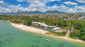 Sea N Tree Beachfront Residences by Oceanaxe Holidays